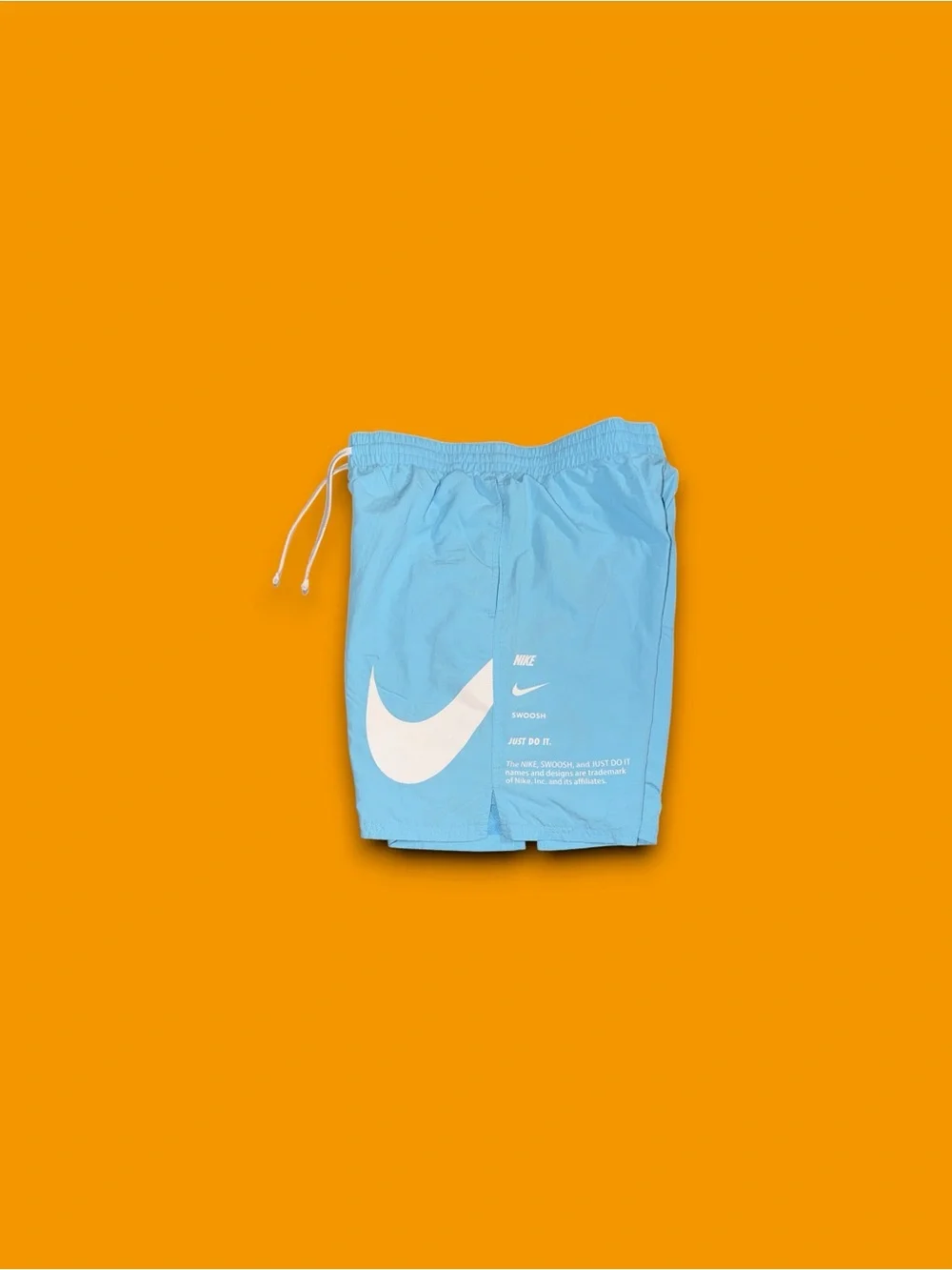 Nike sportswear mesh lined big swoosh athletic shorts light blue mens small